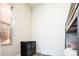 Bunk bedroom features a gray storage unit, a window, and carpet, providing a functional and minimalist aesthetic at 1323 Elati St # 3, Denver, CO 80204