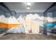 Spacious garage with a unique mountain goat mural, great for storage or creative projects at 1323 Elati St # 3, Denver, CO 80204