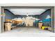 Garage features a desert mountain mural, great for storage and projects at 1323 Elati St # 3, Denver, CO 80204