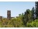 Scenic view of mountains and mature trees with attractive brick architecture at 1323 Elati St # 3, Denver, CO 80204