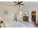 Spacious bedroom showcasing an open ensuite bathroom and walk-in closet at 2312 Dogwood Dr, Erie, CO 80516
