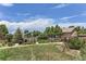 Beautiful community pool area with lounge chairs, shaded areas, and a spa for residents at 2312 Dogwood Dr, Erie, CO 80516