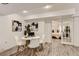Inviting living area with wood flooring, modern decor and comfortable atmosphere visible from bedroom at 2312 Dogwood Dr, Erie, CO 80516