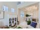 Open-concept with high ceilings connecting to dining area and plenty of natural light at 2312 Dogwood Dr, Erie, CO 80516