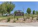 Entrance to Columbine Mine Park with a decorative sign and landscaping at 2312 Dogwood Dr, Erie, CO 80516