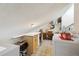 Attic with laundry, counter space and storage, presenting a functional and organized area at 6515 Pinewood Dr, Parker, CO 80134