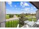 A balcony offers scenic views of a golf course and surrounding neighborhood at 6515 Pinewood Dr, Parker, CO 80134