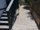 View of a side yard with gravel landscaping at 102 Jackson Dr, Firestone, CO 80520