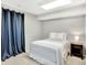 Serene bedroom featuring a comfortable bed, soft lighting, and a calming color scheme at 13935 E Idaho Pl, Aurora, CO 80012