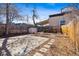 Backyard featuring a patio, shed, hammock, and privacy fence at 279 Delaware St, Denver, CO 80223