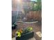 Relaxing backyard with pavers, mulch, seating area and flowers at 279 Delaware St, Denver, CO 80223