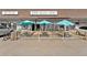 Casual brewery with outdoor seating, featuring picnic tables and umbrellas for a relaxed experience at 279 Delaware St, Denver, CO 80223