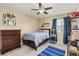 This bedroom is well lit, with personalized decorations and comfortable furniture at 3319 Starry Night Loop, Castle Rock, CO 80109