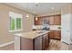 Modern kitchen featuring granite countertops, stainless steel appliances, and ample cabinet space at 3319 Starry Night Loop, Castle Rock, CO 80109