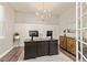 Dedicated office space with modern lighting, wainscoting and a large work desk at 3319 Starry Night Loop, Castle Rock, CO 80109