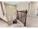 Carpeted staircase leads to the upper level, showcasing the home's spacious layout at 3319 Starry Night Loop, Castle Rock, CO 80109