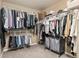 This walk-in closet is spacious and provides ample storage space for all your wardrobe needs at 3319 Starry Night Loop, Castle Rock, CO 80109