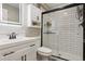 Modern bathroom with a glass enclosed shower, vanity, and updated fixtures at 3540 Brushwood Dr, Castle Rock, CO 80109