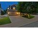 Charming two-story home with a well-manicured lawn, covered porch, and two car garage at 3540 Brushwood Dr, Castle Rock, CO 80109
