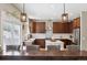 Kitchen with a center island, stainless steel appliances, quartz countertops, and breakfast bar seating at 3540 Brushwood Dr, Castle Rock, CO 80109