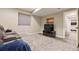 Basement with leather sofa, television, carpet and nearby stairs at 3540 Brushwood Dr, Castle Rock, CO 80109