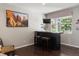 Comfortable den with bar and stools and decor at 3540 Brushwood Dr, Castle Rock, CO 80109