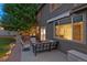 Backyard patio with built in grill, outdoor furniture, and string lights creating a relaxing atmosphere at 3540 Brushwood Dr, Castle Rock, CO 80109
