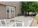 Spacious backyard patio ideal for outdoor lounging and entertaining, complete with seating and lawn games at 3540 Brushwood Dr, Castle Rock, CO 80109