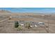 Spacious rural property includes home, outbuildings, mature trees, and plenty of parking spaces at 11810 Mesa View Rd, Larkspur, CO 80118