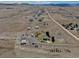 Peaceful rural property features scattered homes, barns, and a serene landscape with mountain views at 11810 Mesa View Rd, Larkspur, CO 80118