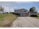 Two-story home with attached two-car garage and convenient outbuilding at 11810 Mesa View Rd, Larkspur, CO 80118