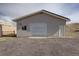 Exterior view of detached garage with ample parking space on a large lot at 11810 Mesa View Rd, Larkspur, CO 80118