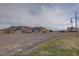 Extensive property showcasing outbuildings and ample parking for trucks and trailers at 11810 Mesa View Rd, Larkspur, CO 80118
