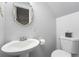 Charming half bathroom with pedestal sink and modern fixtures at 7999 Chase Cir # 31, Arvada, CO 80003