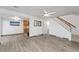 Inviting living area with staircase to upper level and convenient half bathroom access at 7999 Chase Cir # 31, Arvada, CO 80003