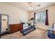 Spare bedroom with a window and neutral carpet; great for guests or a home gym at 552 S Mobile Pl, Aurora, CO 80017