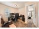 Bedroom boasts ample workspace with dual monitors and comfortable office chair at 552 S Mobile Pl, Aurora, CO 80017
