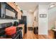 Galley kitchen features granite countertops, stainless steel appliances, and wood flooring at 552 S Mobile Pl, Aurora, CO 80017