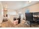 Open upstairs landing featuring work space with monitor and executive chair at 552 S Mobile Pl, Aurora, CO 80017