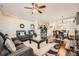 Inviting living room with hardwood floors, plush seating, and open layout to the kitchen and dining at 552 S Mobile Pl, Aurora, CO 80017