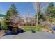 Picturesque backyard featuring a lush green lawn, mature trees, and a serene outdoor space at 1413 Ben Nevis Ave, Broomfield, CO 80020