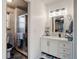 Clean bathroom with a modern vanity, shower, and toilet at 1413 Ben Nevis Ave, Broomfield, CO 80020