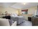 Bedroom featuring neutral walls, carpeting, and furniture at 1413 Ben Nevis Ave, Broomfield, CO 80020