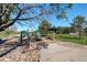 Community playground with play structure, bench and shade in a common area at 1413 Ben Nevis Ave, Broomfield, CO 80020