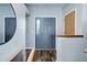 Welcoming foyer with hardwood floors and a stylish front door at 1413 Ben Nevis Ave, Broomfield, CO 80020