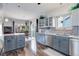 Well-designed kitchen with stainless steel appliances, granite countertops, and an open layout at 1413 Ben Nevis Ave, Broomfield, CO 80020