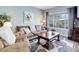 Cozy living room with a comfortable couch, decorative pillows, and a view of the backyard at 1413 Ben Nevis Ave, Broomfield, CO 80020
