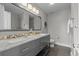 Elegant bathroom with double vanity, marble countertops, and a large shower at 2510 Concord Cir, Lafayette, CO 80026