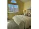 Charming bedroom with a queen-size bed and a window seat at 2510 Concord Cir, Lafayette, CO 80026