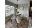 Bright dining area with a glass table and four chairs at 2510 Concord Cir, Lafayette, CO 80026